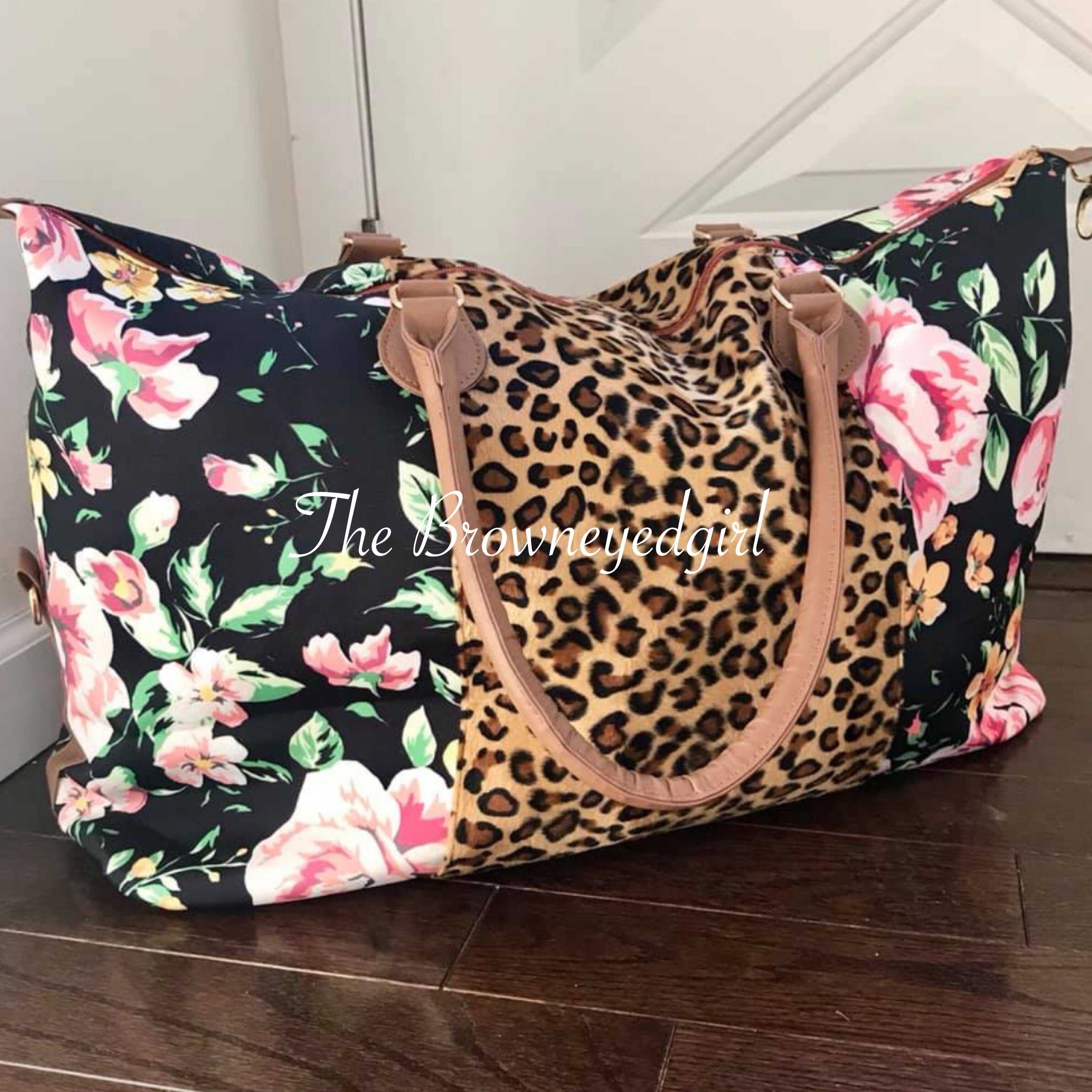 Leopard and store floral weekender bag